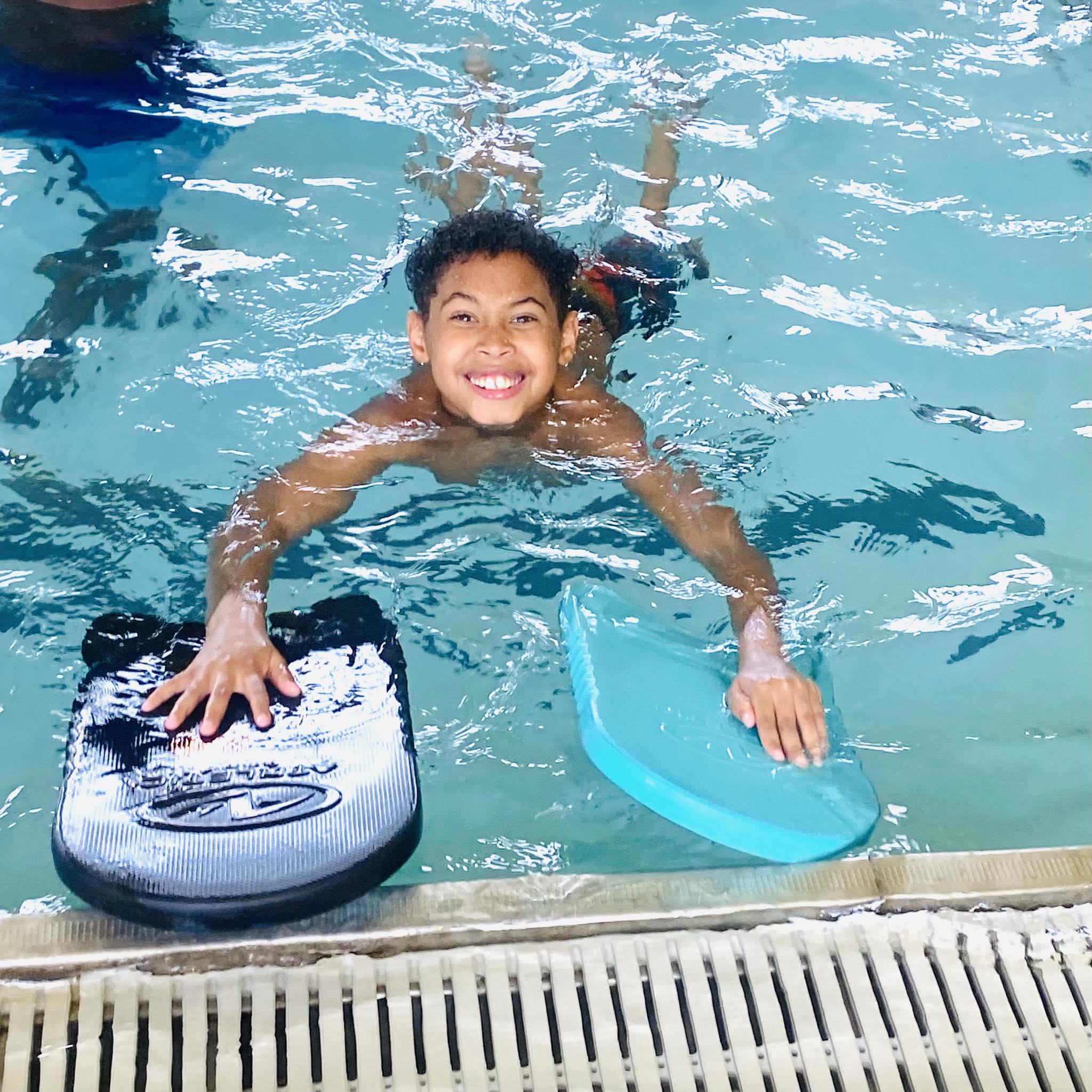 A boy in a pool.